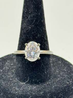 Oval Moissanite Four Prong Solitaire Engagement Ring